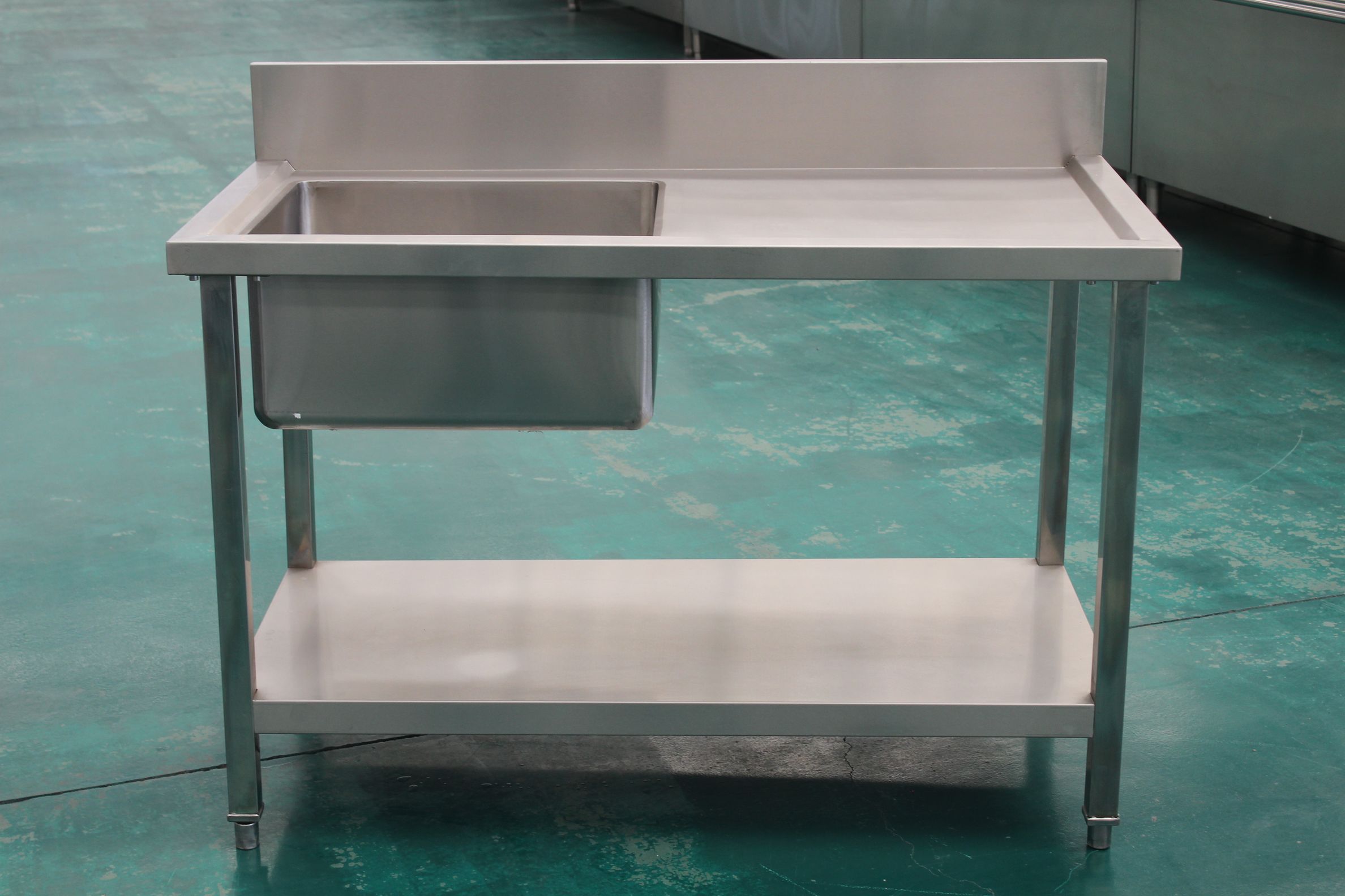 Stainless steel sink with drainboard